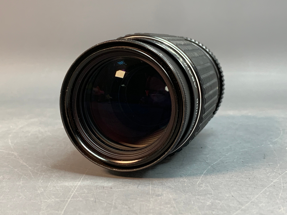 SMC Pentax-M 75–150 mm f/4 Небольшие точки внутри линзы