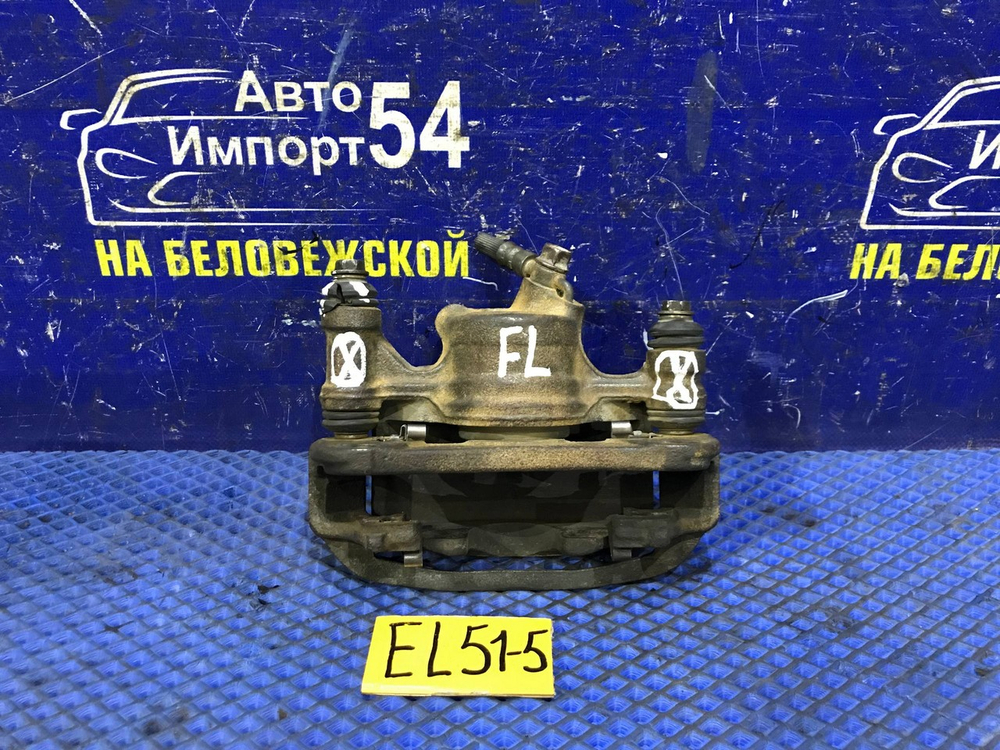 Суппорт тормозной передний левый TOYOTA CORSA 1997