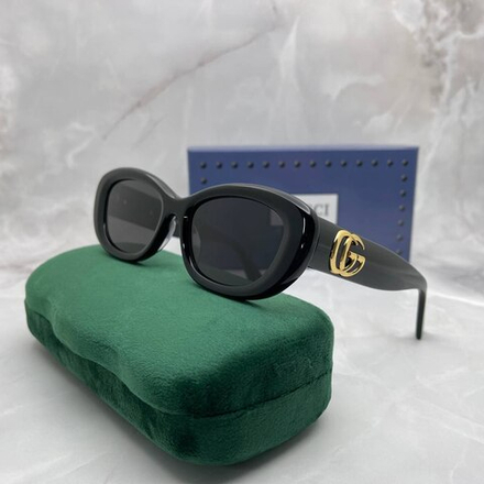 Солнцезащитные очки Gucci