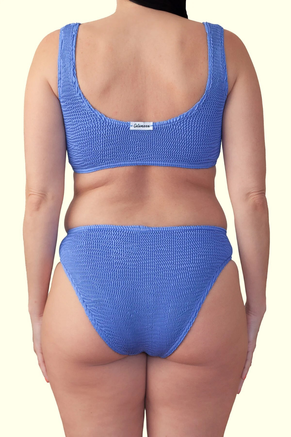 Топ купальника синий