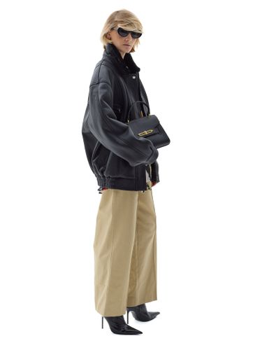 Черная кожаная оверсайз дубленка с отложным воротником