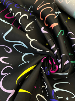 Курточно-плащевая ткань п/э Emilio Pucci черная с разноцветными надписями и лого