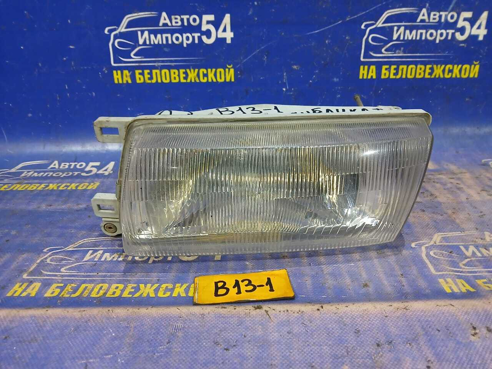 Фара передняя левая NISSAN SUNNY 1990