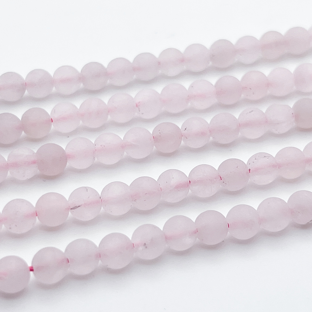 Розовый кварц матовый (тонирован), диаметр 5,7-5,8 мм, цена за 31-32 шт (1/2 нити)