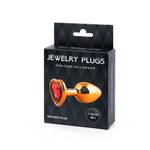 Золотистая анальная пробка с красным стразом-сердечком - 7 см. (Цвет: красный)