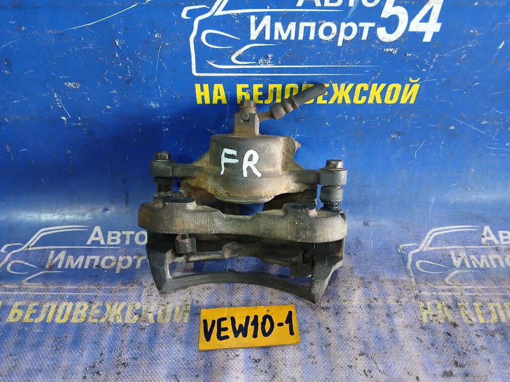 Суппорт тормозной передний правый NISSAN AVENIR 1997