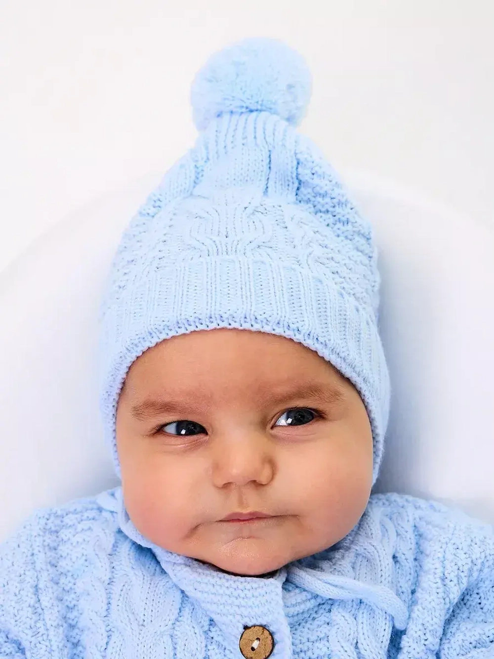 вязаный комбинезон для новорожденных