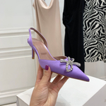 Amina Muaddi Pumps
