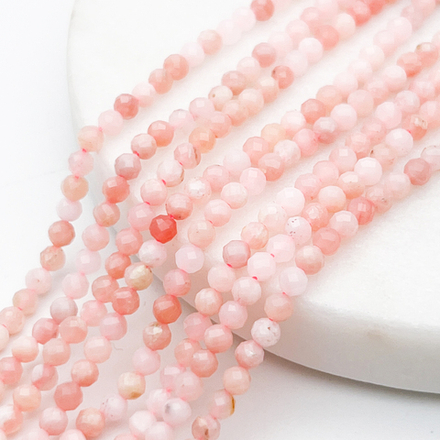 Опал розовый граненый бусины, диаметр около 3-3,2 мм, цена за отрезок 19 см (1/2 нити)