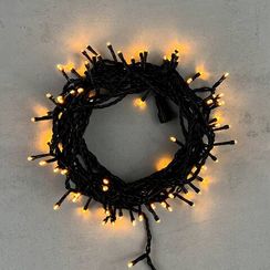 Светодиодная нить 100 экстра теплых белых LED ламп, 10 м., 24В, черный провод ПВХ, LTC (PST100-11-1EWW)