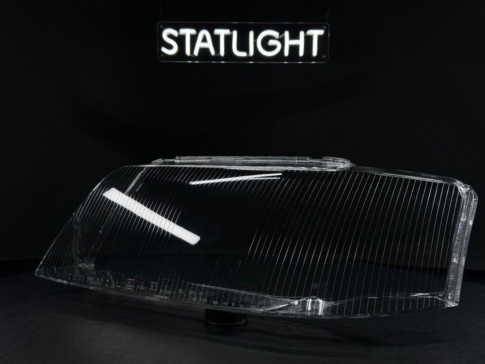 Левое стекло фары Audi A6 C5 1997-2001