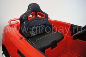 Детский электромобиль River Toys Nissan GTR X333XX красный