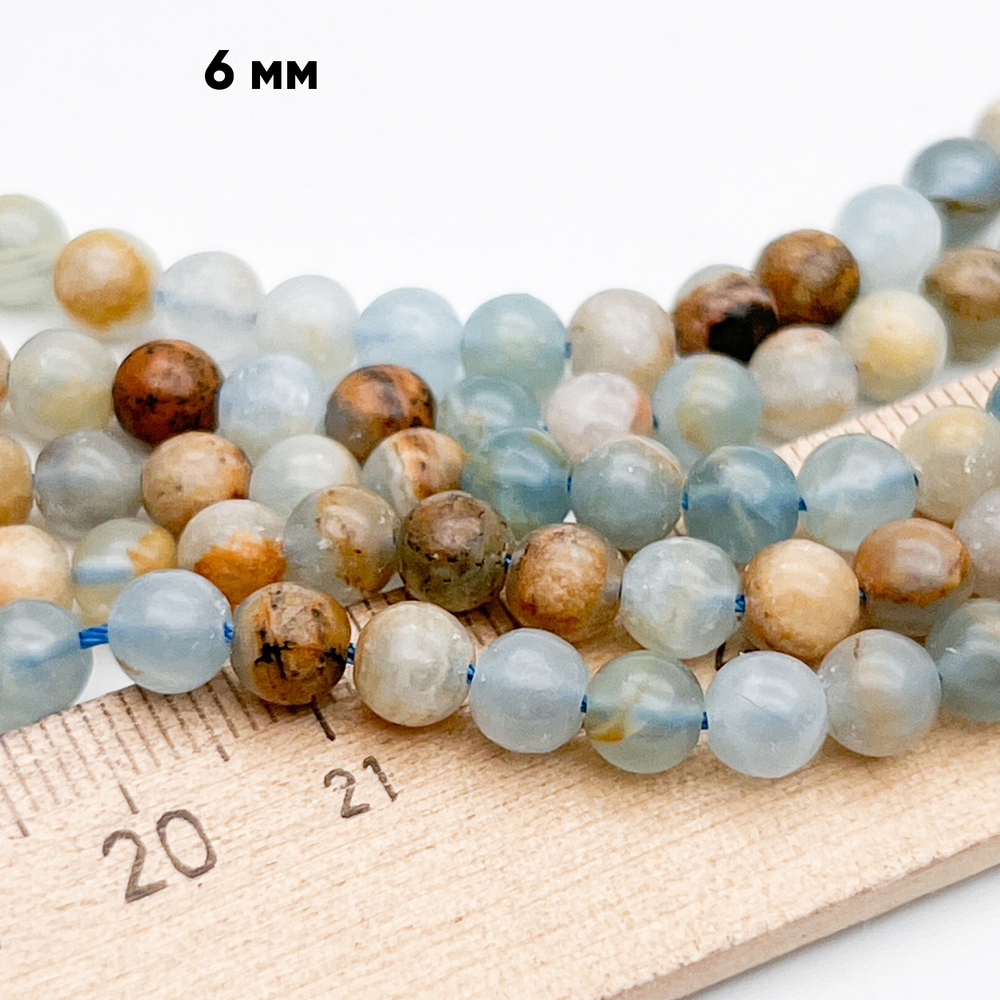 Кальцит голубой бусины, диаметр около 5,7-5,9 мм, цена за 17-18 шт (1/4 нити)