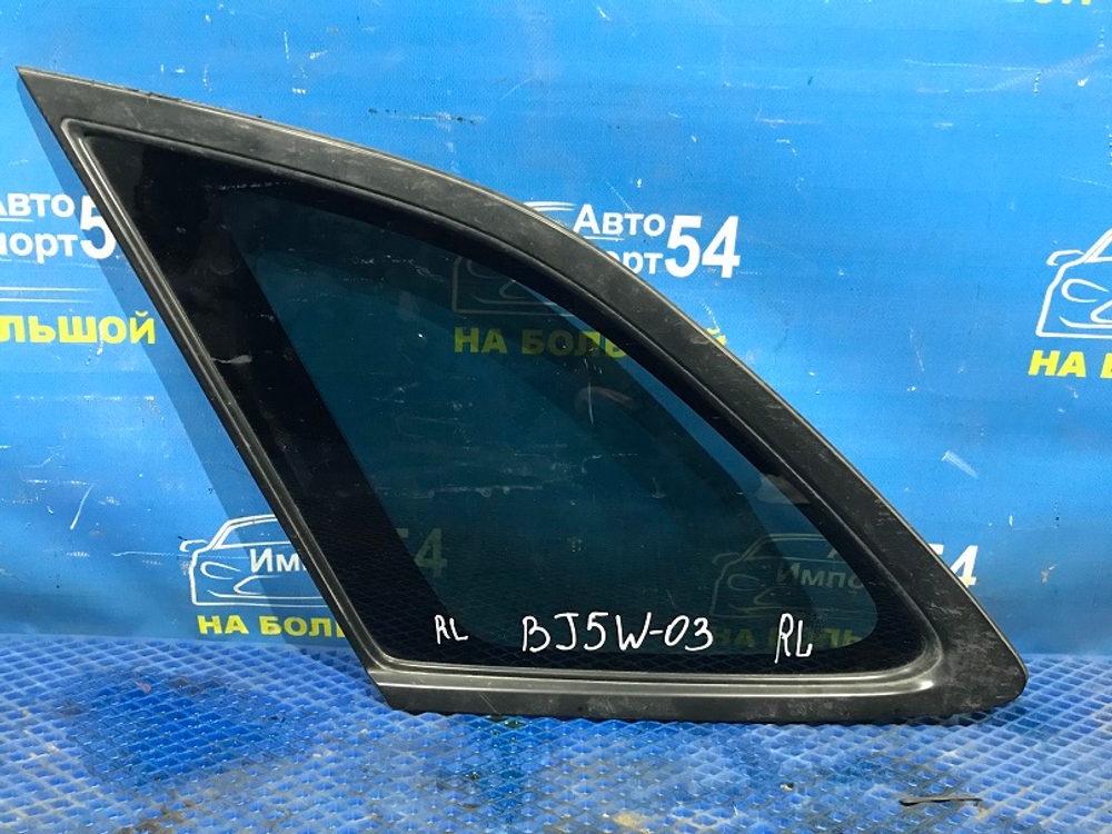 Стекло багажника левое MAZDA FAMILIA 2001