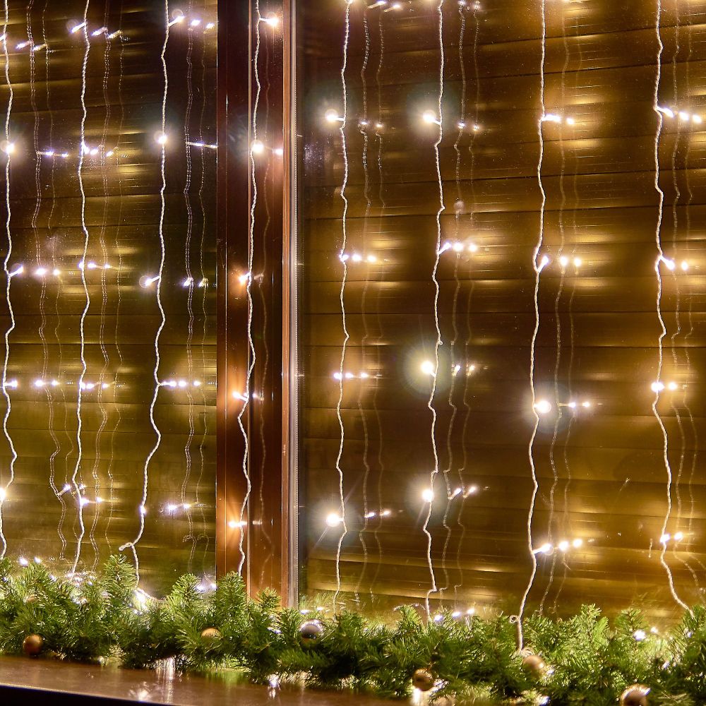 ULD-C3030-192-DTA WARM WHITE IP20 Занавес светодиодный. 3х3м. 192 светодиода. Теплый белый свет. Провод прозрачный. TM Uniel