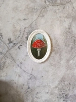 Картина в овальной рамке