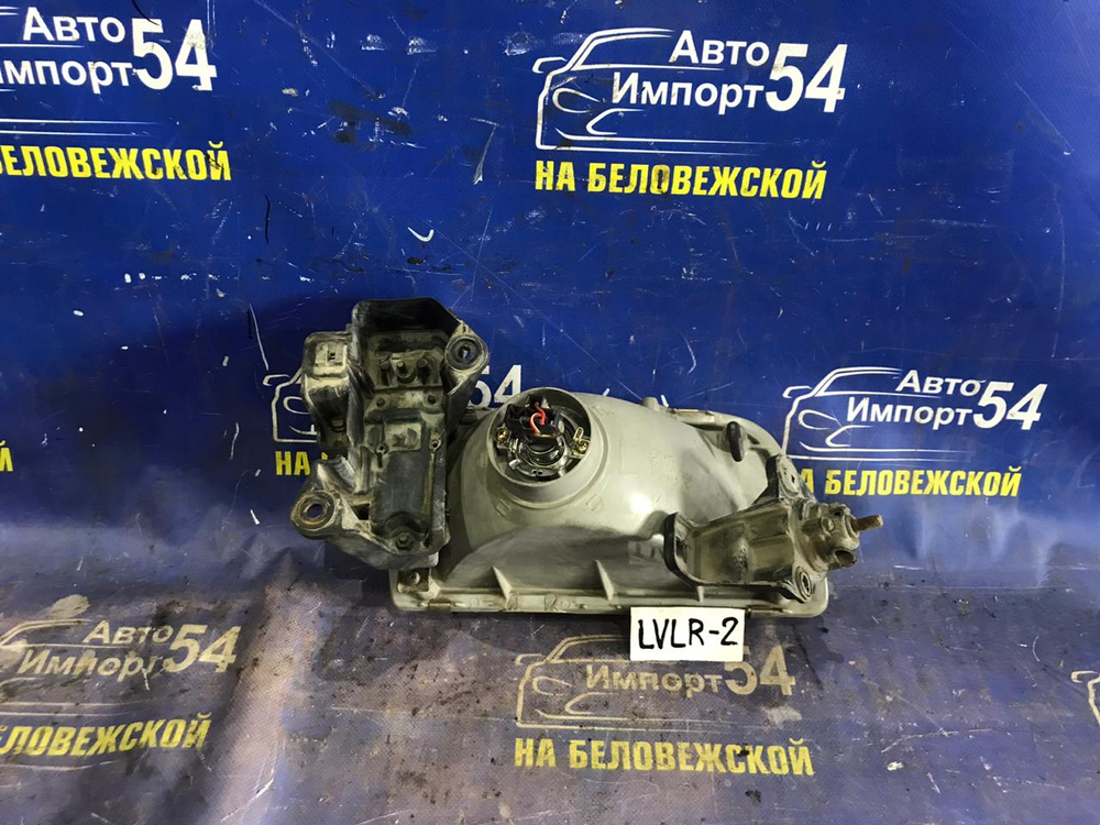 Фара передняя левая MAZDA MPV 1996