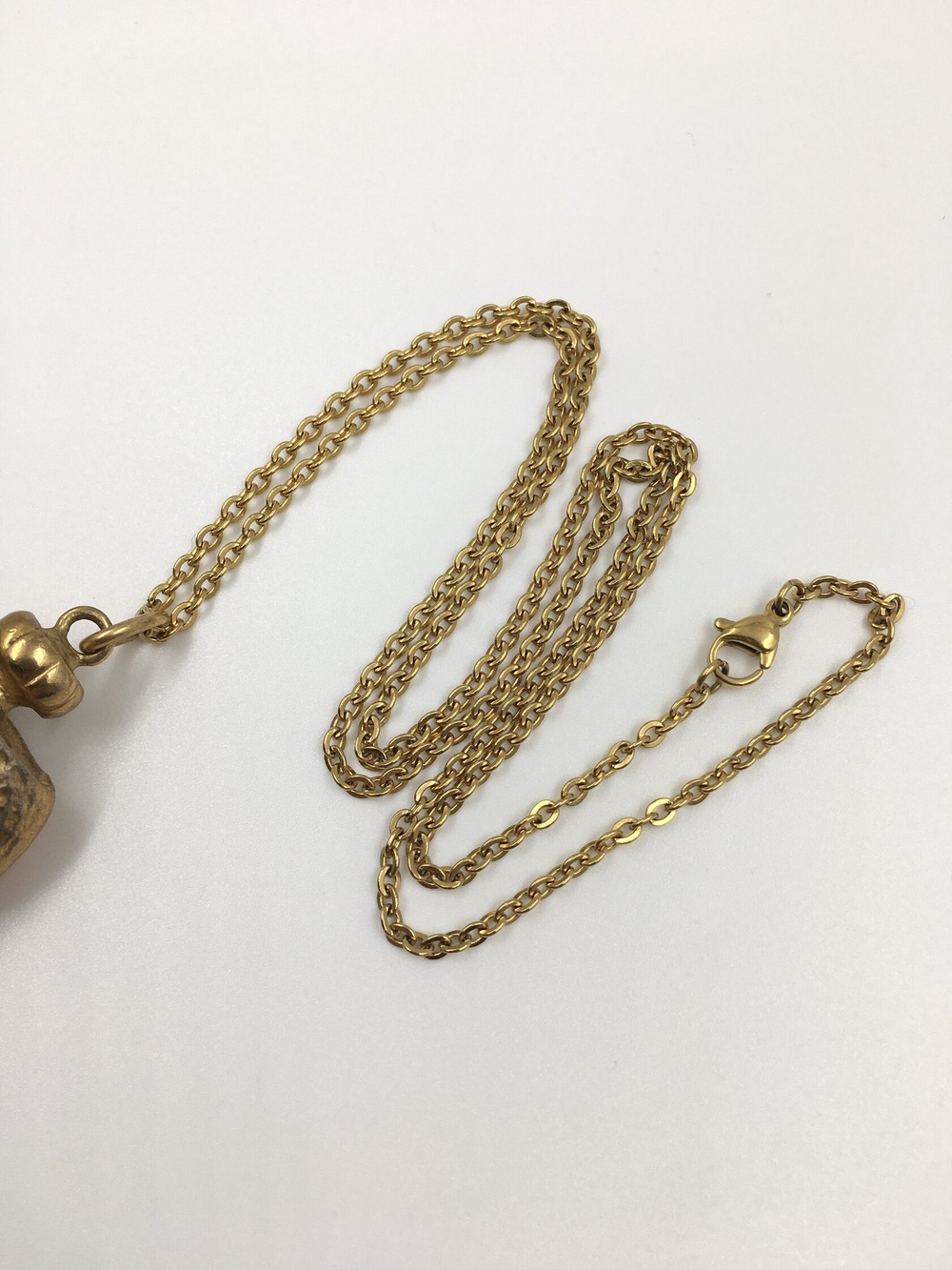 Кулон в виде флакона YSL