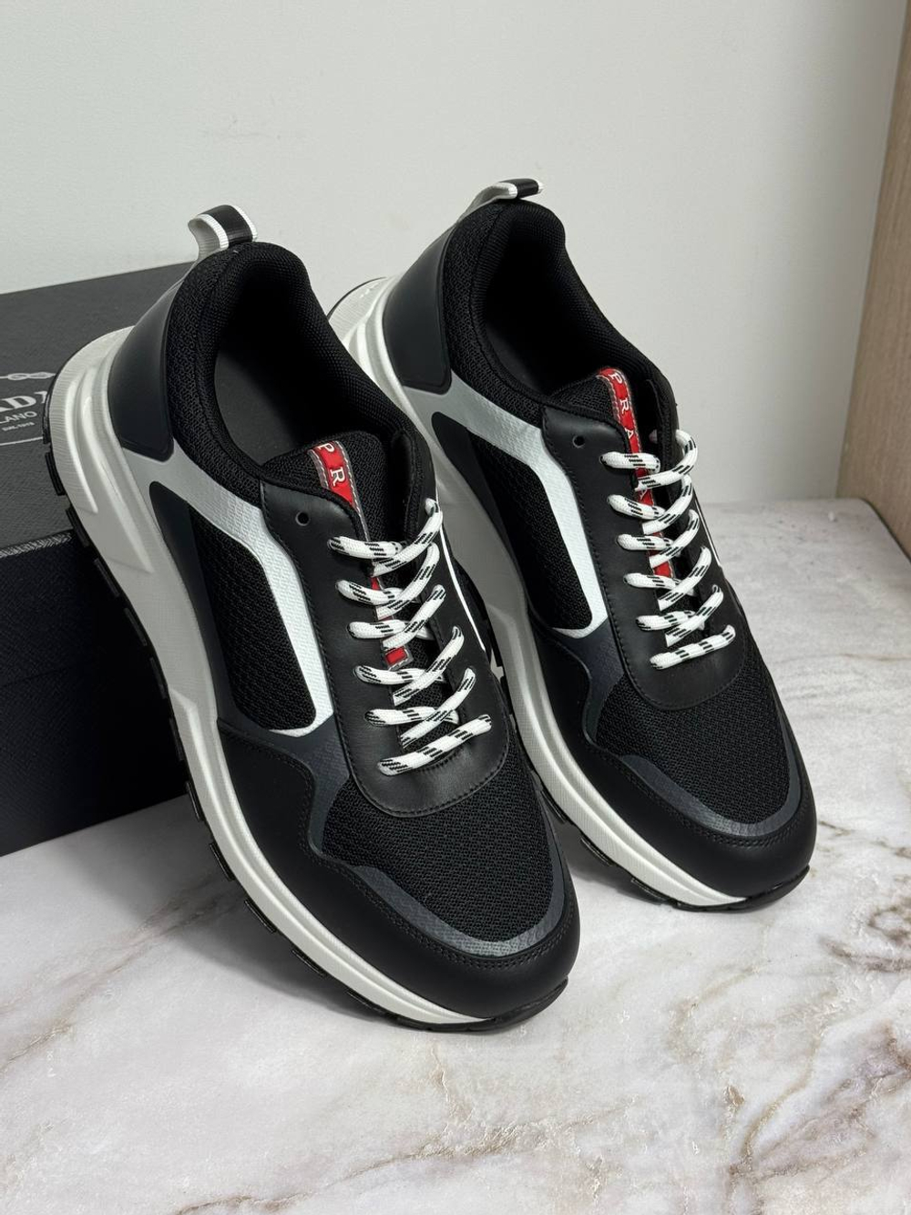 Кроссовки Prada