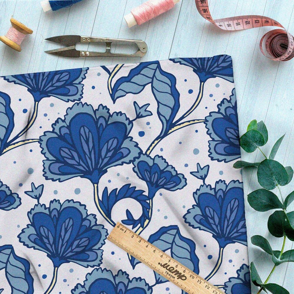 Ткань кулирная гладь синие цветы-перья на белом фоне