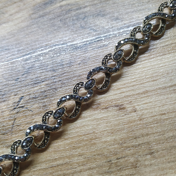 Браслет Венеция восьмерка овал стразы графит металл черненый золотистый