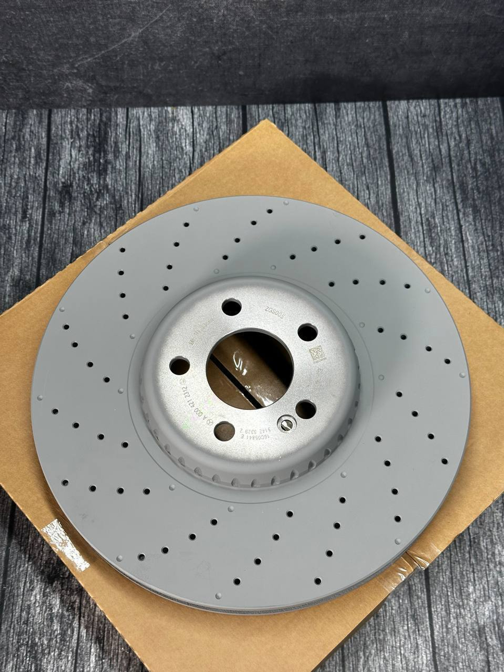 Тормозной диск передний Mercedes-Benz A0004212312