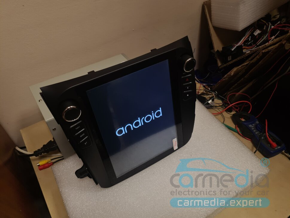 Магнитола для Mitsubishi Outlander 2/XL (CW), Peugeot 4007, Citroen C-Crosser (Rockford) - Carmedia ZF-1106-Q6 вертикальный экран 10.4" в стиле "Тесла" на Android 11, Snapdragon, 8/128Гб, CarPlay, 4G SIM-слот