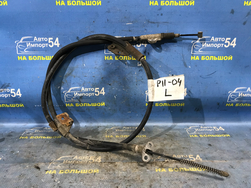 Трос ручника левый NISSAN PRIMERA 1999