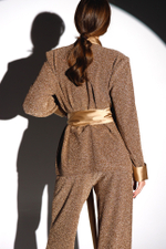 Костюм двойка из мерцающего трикотажа в бежевом оттенке