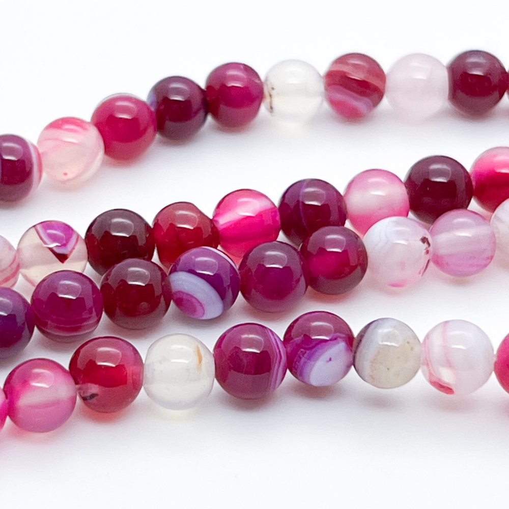 Агат тонированный, цвет фуксия, диаметр 6,1-6,3 мм, цена за 31-32 шт (1/2 нити)