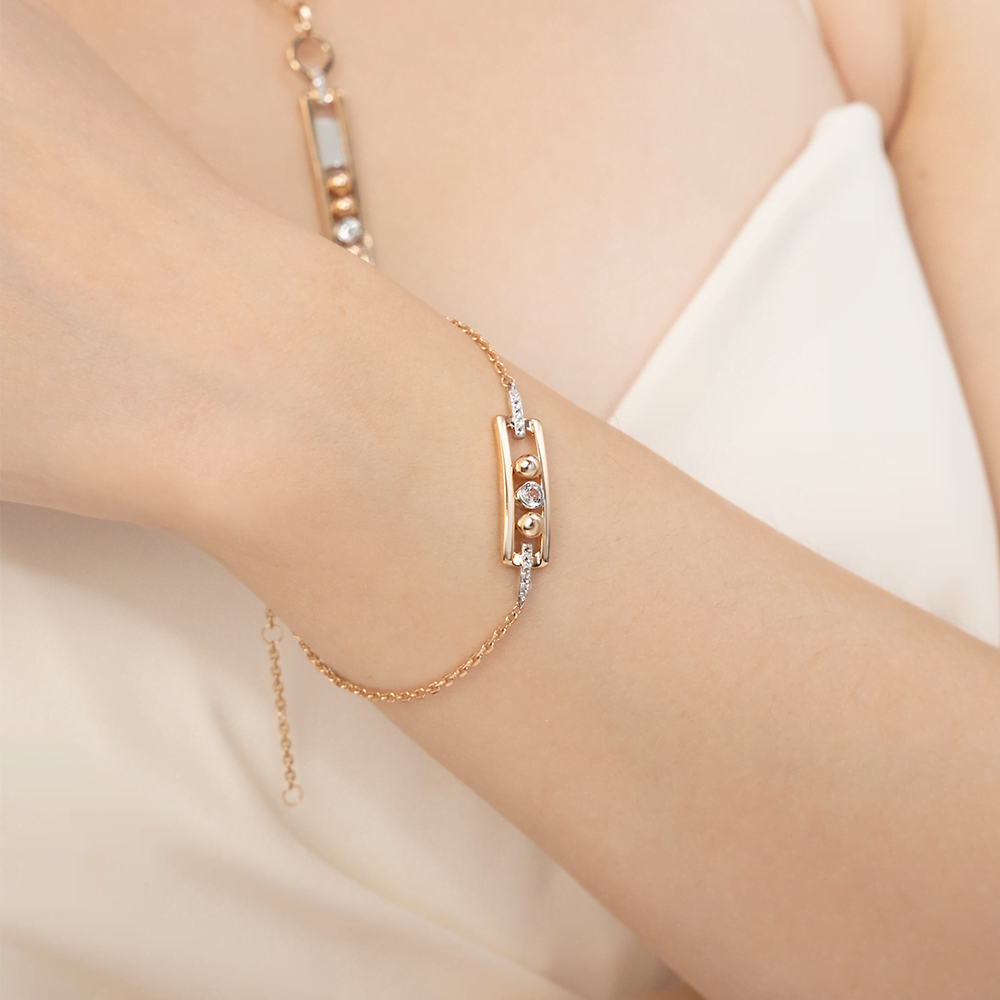 Браслет «Дуэт форм» из комбинированного золота с натуральными топазами white