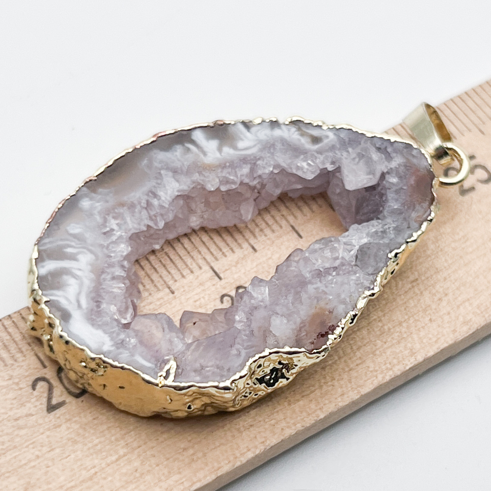 Подвеска срез агата в оправе, размер камня 43*31 мм, цена за 1 шт