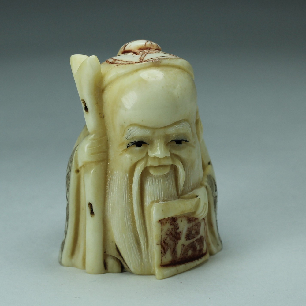 Нэцкэ Шоусин в шапочке и иероглиф счастье