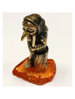 Бронзовая статуэтка на янтаре