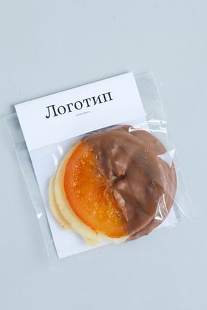 Апельсин в шоколадной глазури с брендированным клапаном