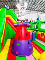 Коммерческий надувной батут "Джунгли" с горкой, 9*6*4.5 м