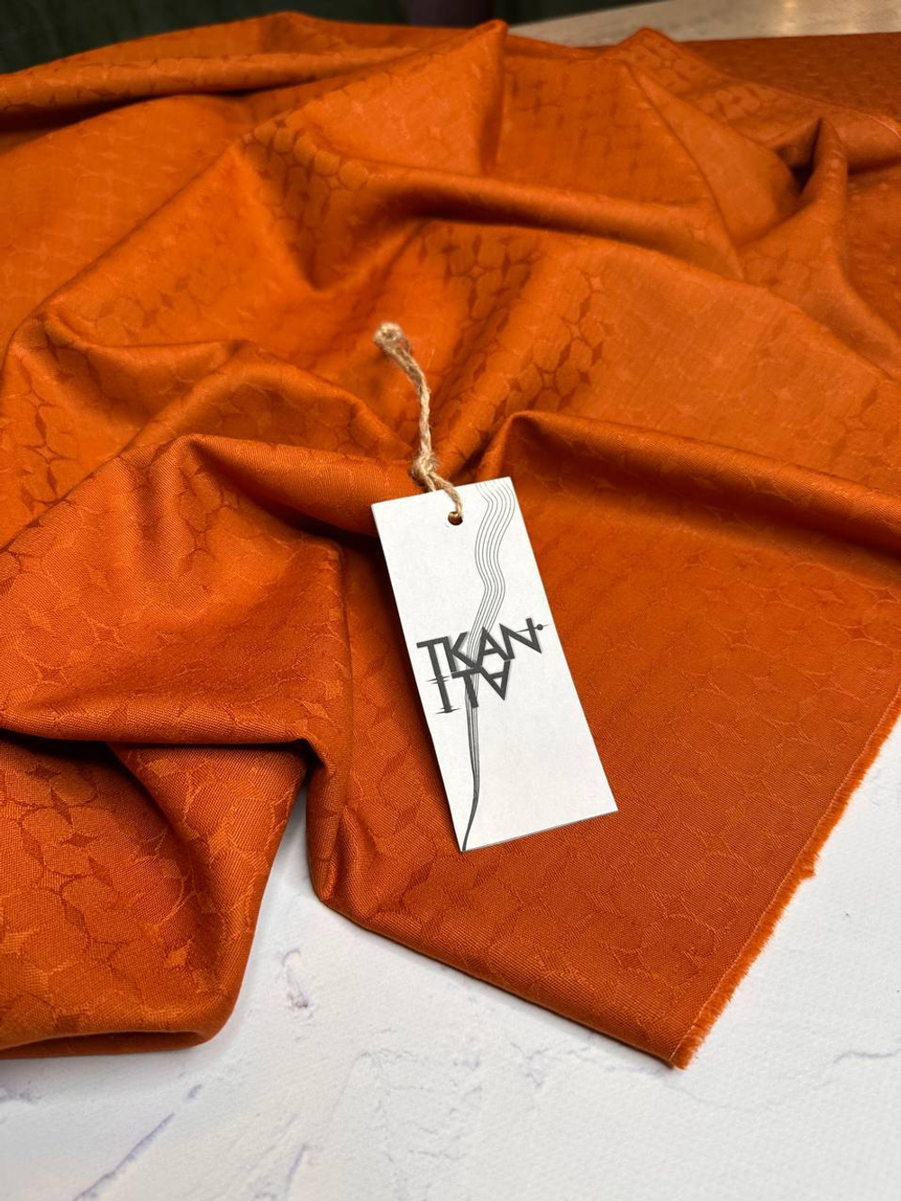 Костюмно-плательная однотонная жаккардовая шерсть с узором (COMME DES GARÇONS, 100%шерсть, Оранжевая охра, 142, 264 гр/м2)