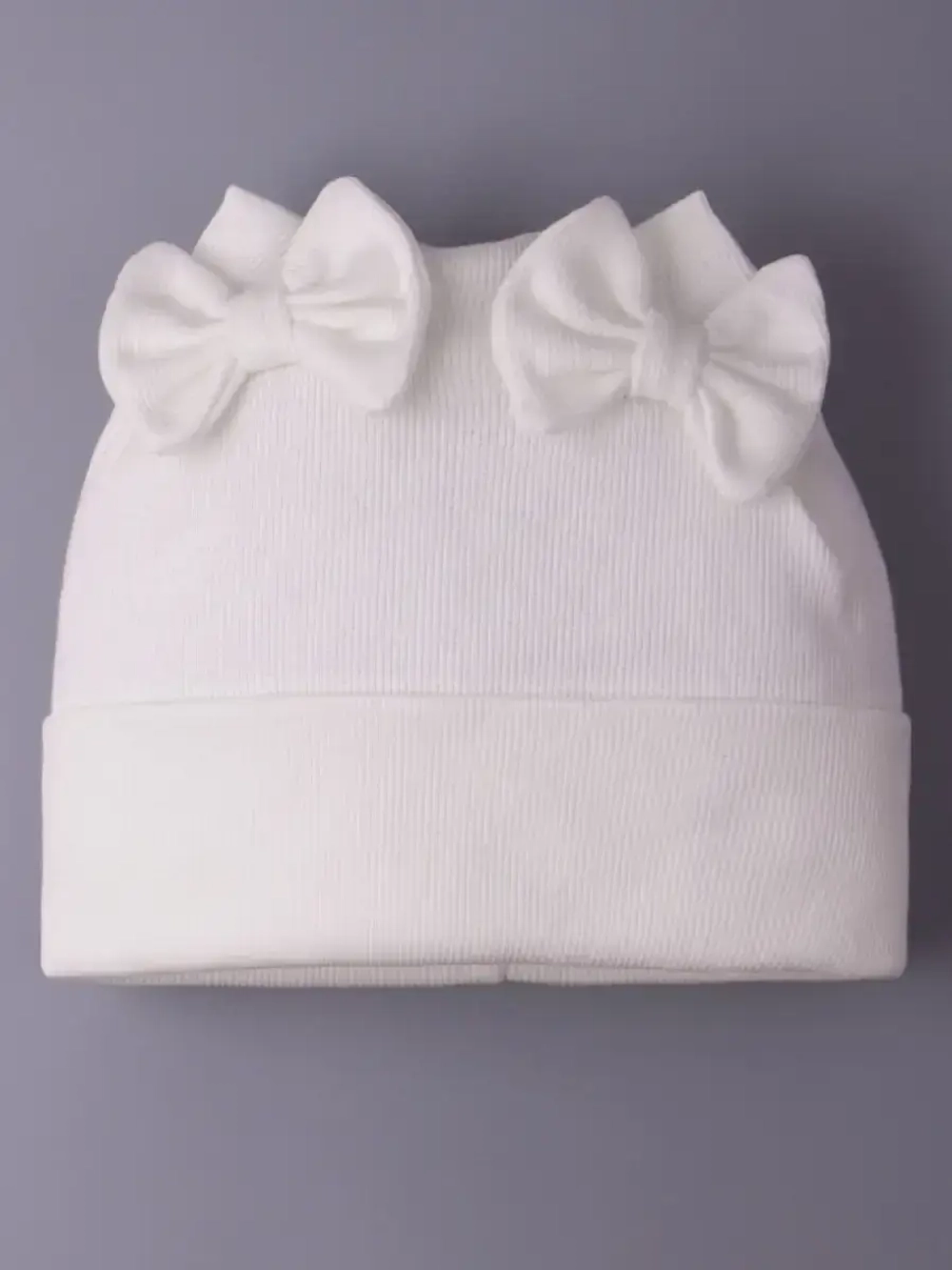 Шапка для девочки осенняя с бантиками