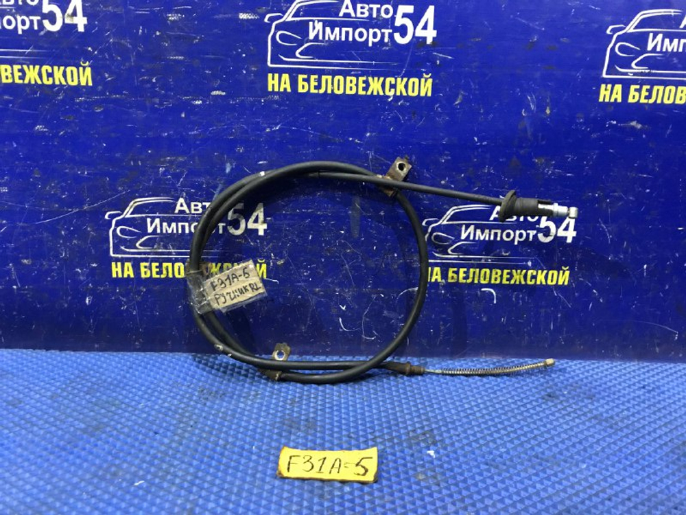 Трос ручника левый MITSUBISHI DIAMANTE 2000