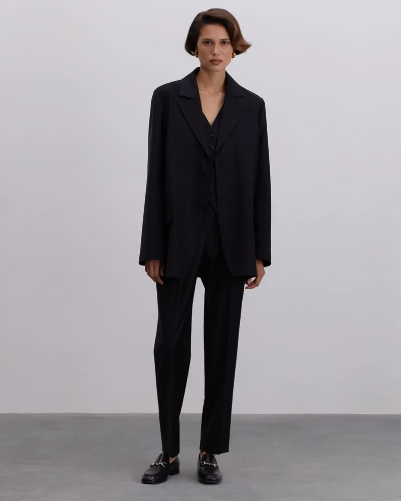 Черный шерстяной жакет с карманами