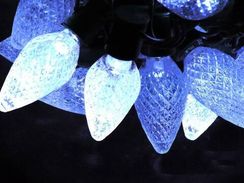 Светодиодная нить Шишки 10 м., 220V, 100 сине-белых LED ламп, черный каучук, соединяемая, Winner (BW.01.7B.100+2,5B)