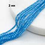 Фианит (кубический цирконий), цвет голубой яркий, размер 2 мм, цена за нить около 130 шт (38 см)