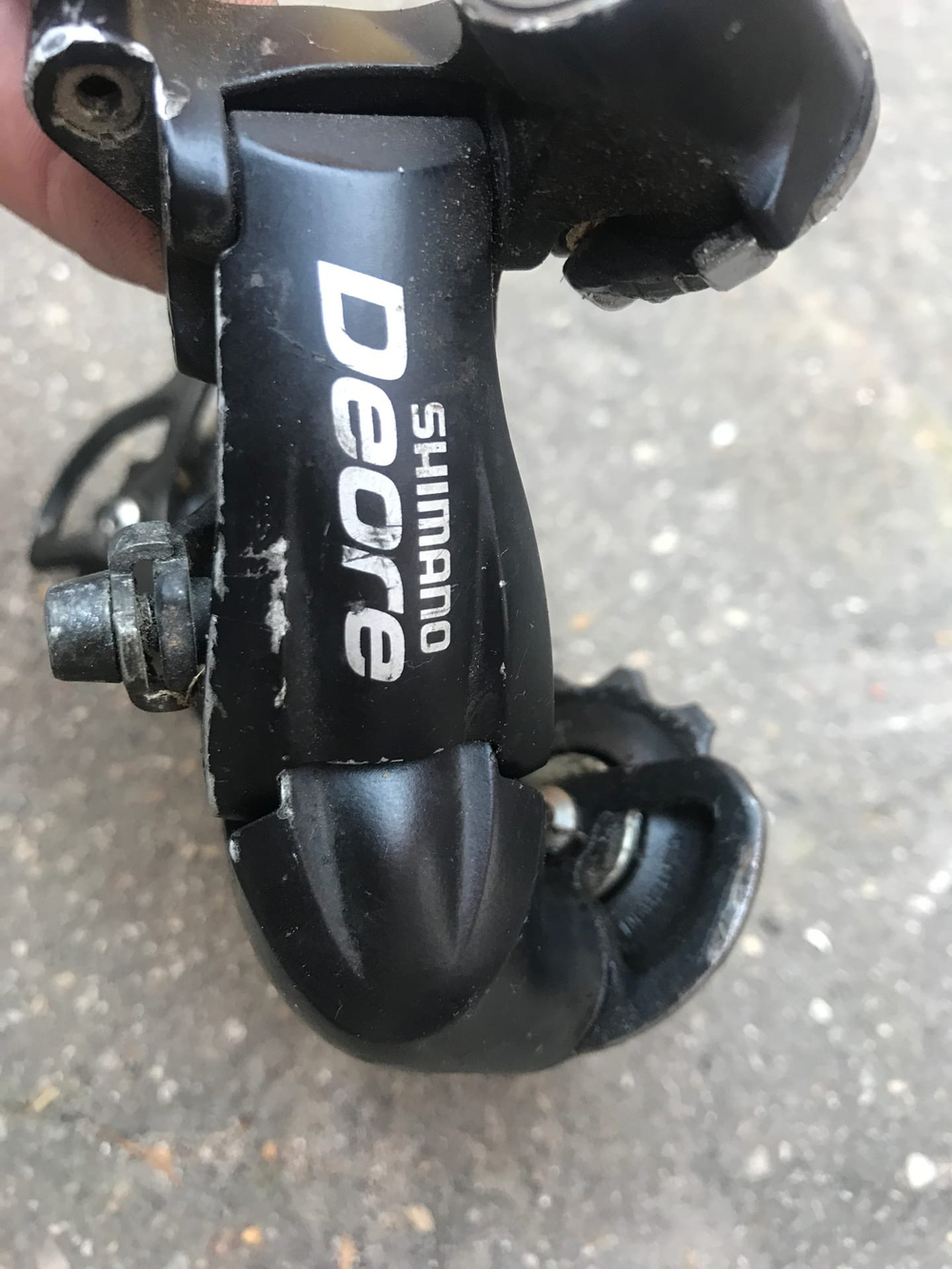 Переключатель задний Shimano Deore  9 скоростей с обратной тягой бу (  9 sp )