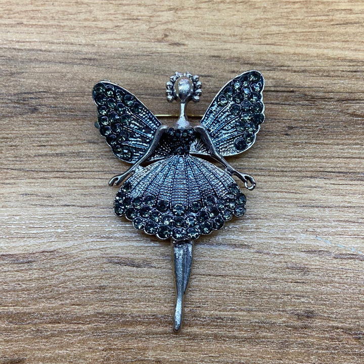 Брошь Ангелочек с диадемой стразы серо-зеленые металл серебристый