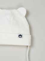 Шапка трикотажная на завязках "Молочный" 0+