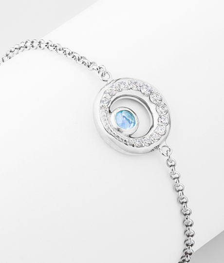 Браслет из серебра со вставками из топаза и бесцветных фианитов