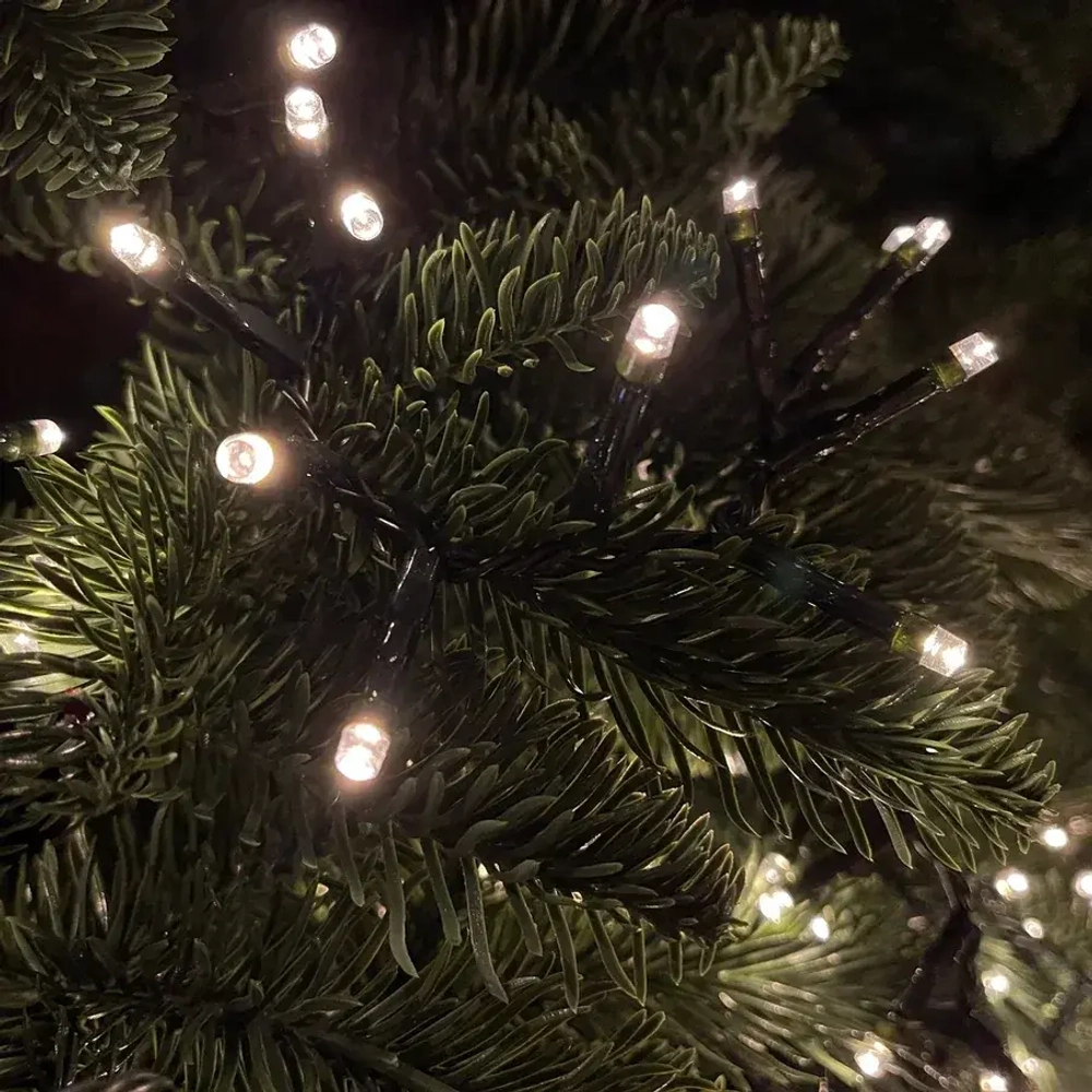 Светодиодная нить Snake Light 2000 теплых белых ламп, 40 м., 24В, 8 режимов, зеленый провод, для елки 260-300 см., Christmas DeLuxe (85744)