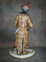 Статуэтка. Фарфор. Клоун с гармонью и обезьяной. Capodimonte. Италия