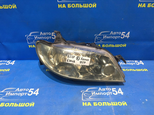 Фара передняя правая MAZDA FAMILIA 2000-2003