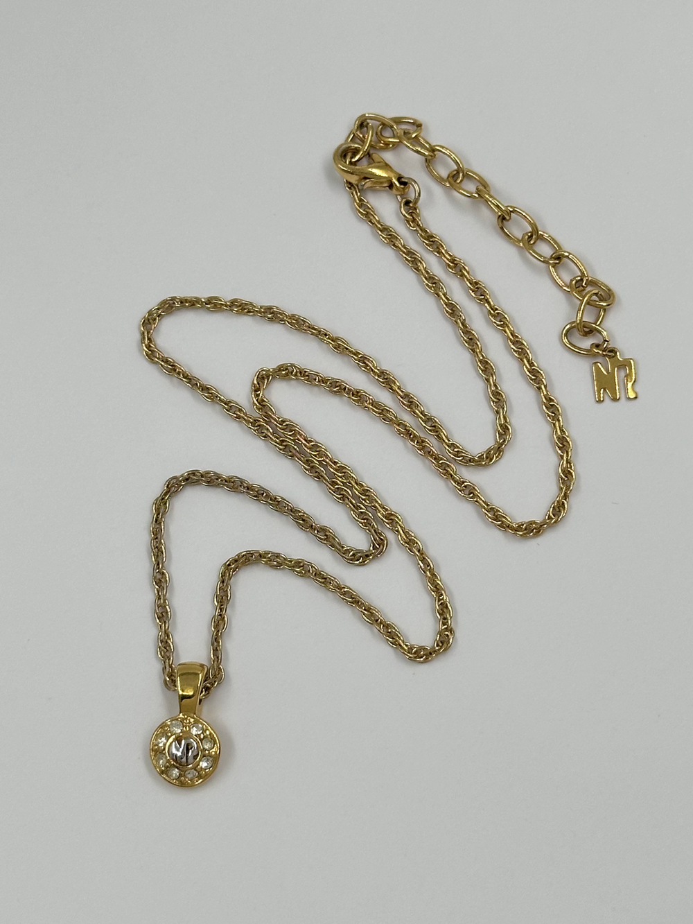 Миниатюрный кулон Nina Ricci